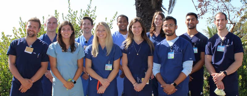 class of 2024 residents standing outside in scrubs